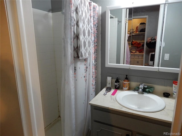 bathroom featuring vanity and walk in shower