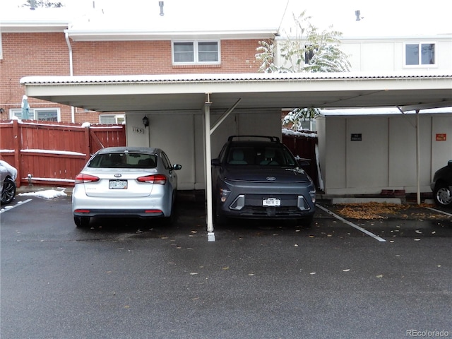 view of vehicle parking with a carport