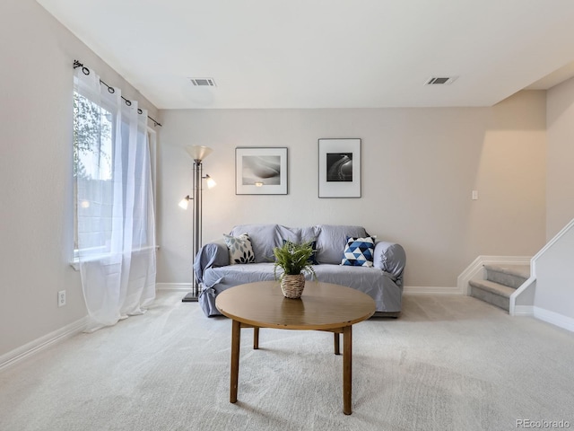 living room with light carpet