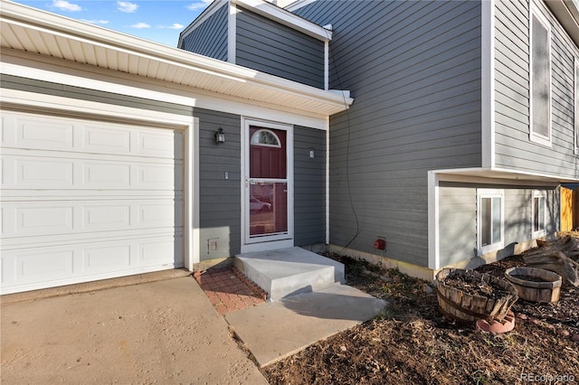 property entrance featuring a garage