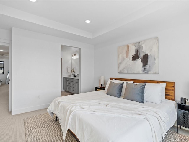 bedroom featuring recessed lighting, baseboards, ensuite bath, and carpet flooring