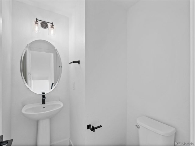 half bathroom with toilet