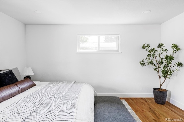 10250 W 33rd Ave, Wheat Ridge, CO 80033 - bedroom featuring wood finished floors and recessed lighting