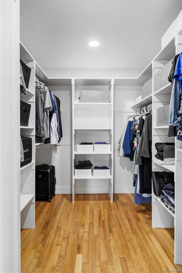 10250 W 33rd Ave, Wheat Ridge, CO 80033 - walk in closet featuring wood finished floors
