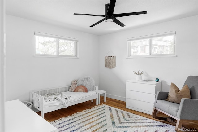 10250 W 33rd Ave, Wheat Ridge, CO 80033 - bedroom featuring wood finished floors and a ceiling fan