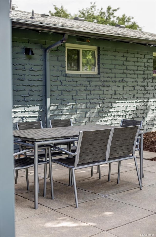 10250 W 33rd Ave, Wheat Ridge, CO 80033 - view of patio / terrace featuring outdoor dining area