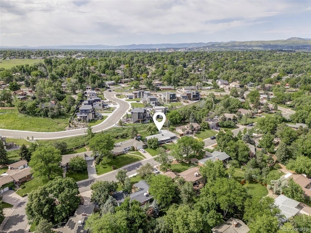 10250 W 33rd Ave, Wheat Ridge, CO 80033 - aerial perspective of suburban area with a mountainous background