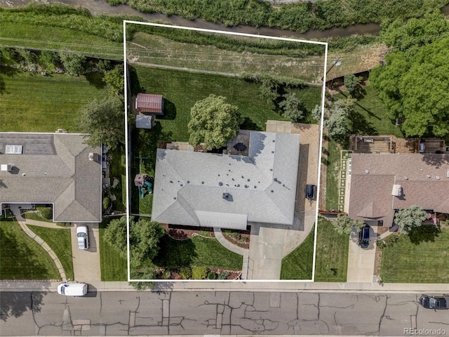 10250 W 33rd Ave, Wheat Ridge, CO 80033 - aerial view of property and surrounding area featuring property boundaries highlighted