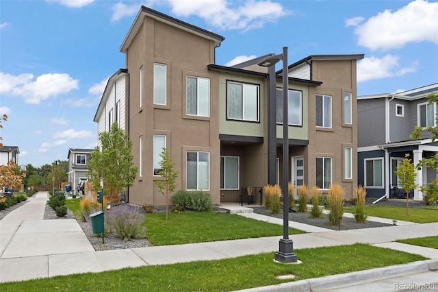 exterior space featuring a front yard