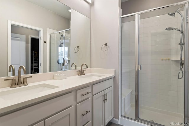 bathroom with vanity and walk in shower