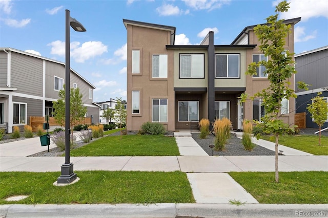 view of front of home with a front yard