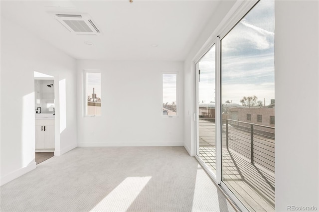 view of carpeted spare room