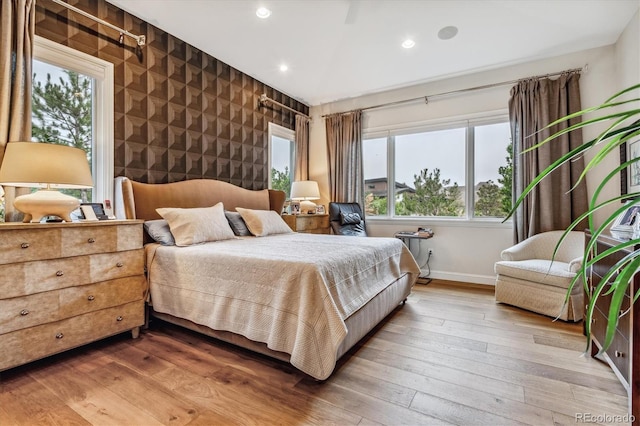 bedroom with light wood-type flooring