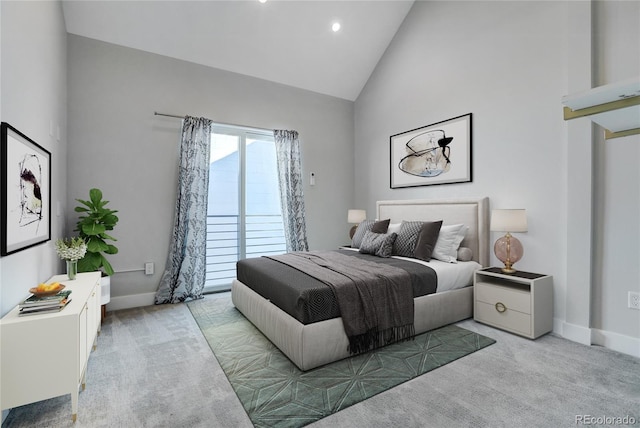 bedroom featuring baseboards, high vaulted ceiling, and carpet