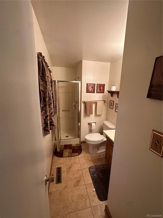 full bathroom featuring visible vents, a stall shower, toilet, and vanity