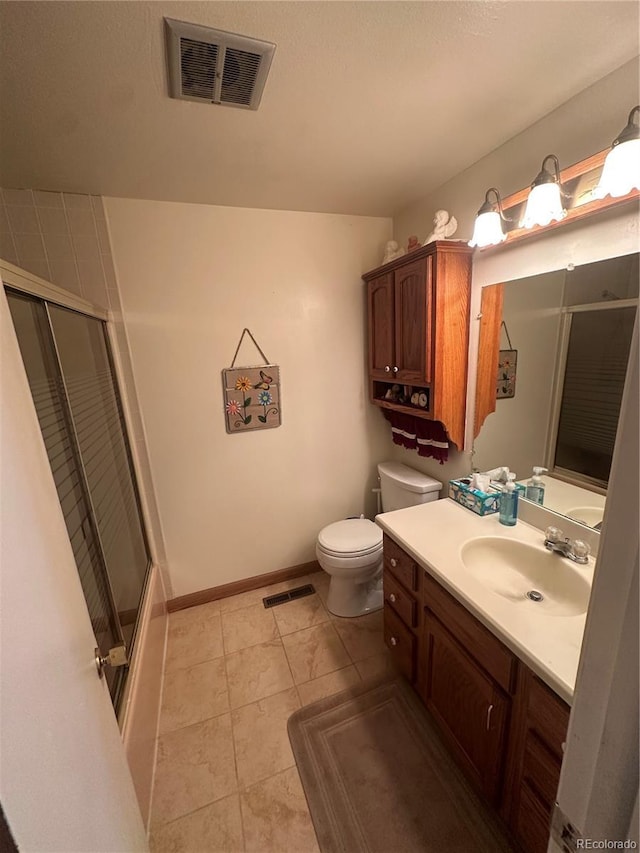 bathroom featuring visible vents, toilet, a shower stall, and tile patterned flooring