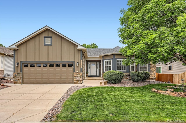 21107 Hawthorne Ln, Parker, CO 80138 - single story home with stone siding, board and batten siding, concrete driveway, an attached garage, and a shingled roof