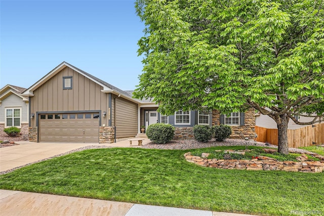 21107 Hawthorne Ln, Parker, CO 80138 - view of front of house with stone siding, board and batten siding, concrete driveway, and a garage