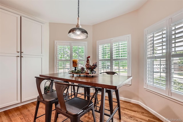 21107 Hawthorne Ln, Parker, CO 80138 - dining space with healthy amount of natural light and light wood-style flooring