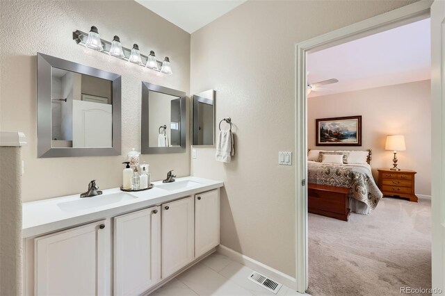 21107 Hawthorne Ln, Parker, CO 80138 - ensuite bathroom featuring double vanity and a ceiling fan