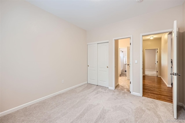21107 Hawthorne Ln, Parker, CO 80138 - unfurnished bedroom featuring light carpet and a closet
