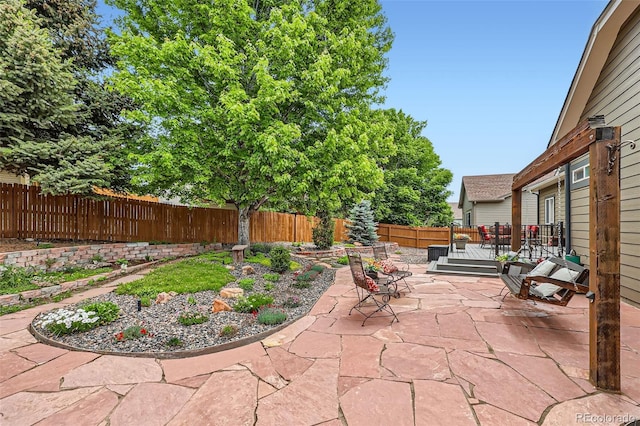 21107 Hawthorne Ln, Parker, CO 80138 - fenced backyard with a patio area