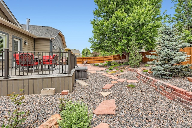 21107 Hawthorne Ln, Parker, CO 80138 - fenced backyard with outdoor dining area and a wooden deck