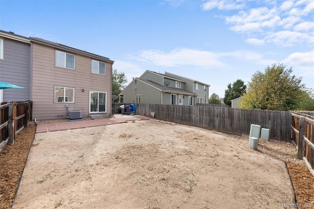 exterior space featuring a patio and cooling unit