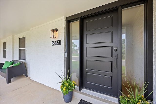 5853 S Havana Ct, Englewood, CO 80111 - doorway to property featuring a porch