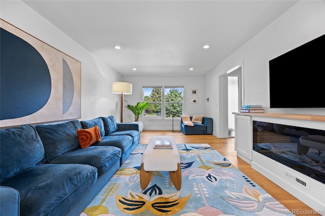 5853 S Havana Ct, Englewood, CO 80111 - living area with light wood-type flooring, recessed lighting, and baseboards
