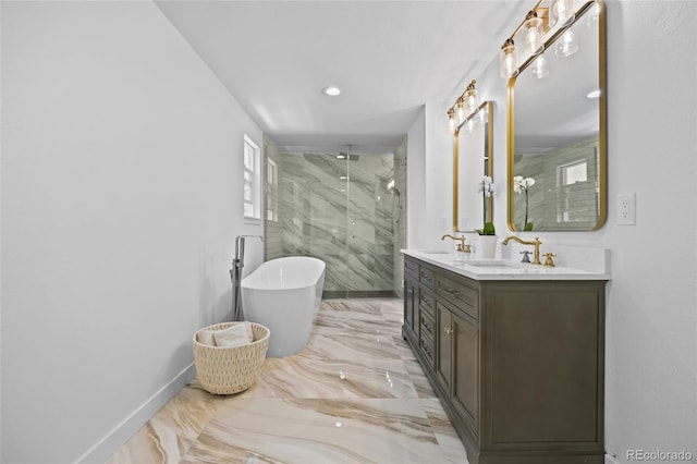 5853 S Havana Ct, Englewood, CO 80111 - full bath with marble tiled flooring, a marble finish shower, double vanity, a freestanding tub, and baseboards