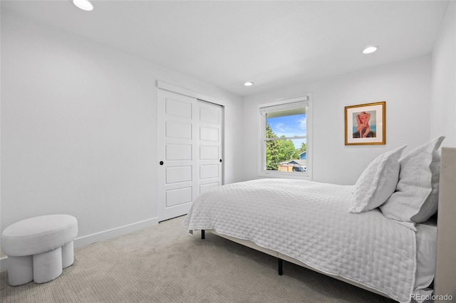 5853 S Havana Ct, Englewood, CO 80111 - bedroom with recessed lighting, carpet floors, baseboards, and a closet