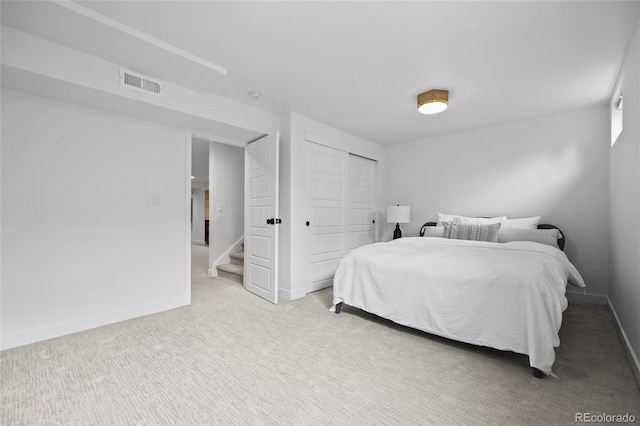 5853 S Havana Ct, Englewood, CO 80111 - carpeted bedroom featuring a closet and baseboards