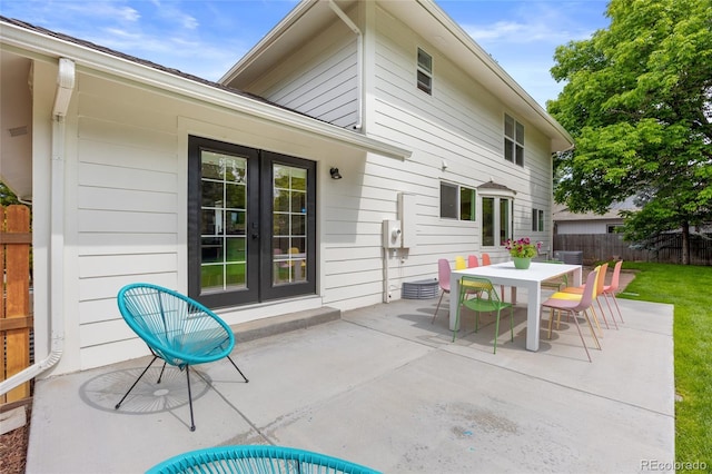 5853 S Havana Ct, Englewood, CO 80111 - view of patio featuring french doors and outdoor dining area