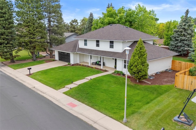 5853 S Havana Ct, Englewood, CO 80111 - traditional-style home with a shingled roof, a garage, driveway, and covered porch