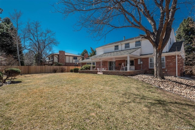 view of yard with fence