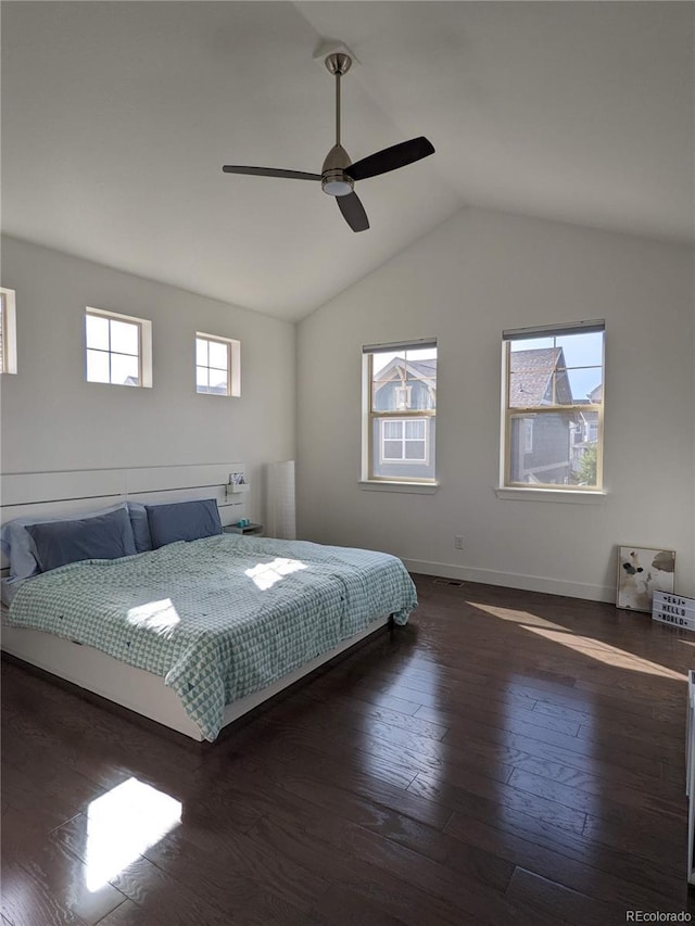 13788 Umatilla Ln, Broomfield, CO 80023 - bedroom featuring lofted ceiling, dark wood-style floors, and a ceiling fan