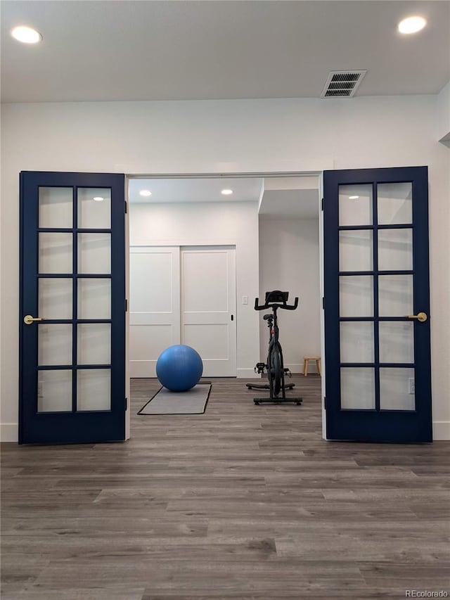 13788 Umatilla Ln, Broomfield, CO 80023 - workout area with wood finished floors and recessed lighting