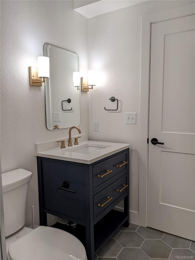 13788 Umatilla Ln, Broomfield, CO 80023 - bathroom with vanity and tile patterned flooring