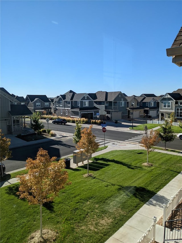 13788 Umatilla Ln, Broomfield, CO 80023 - view of grassy yard with a residential view