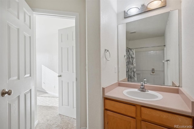 bathroom featuring vanity and a shower with curtain