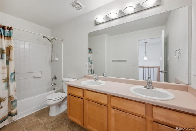 full bathroom featuring toilet, vanity, shower / bathtub combination with curtain, and tile patterned flooring