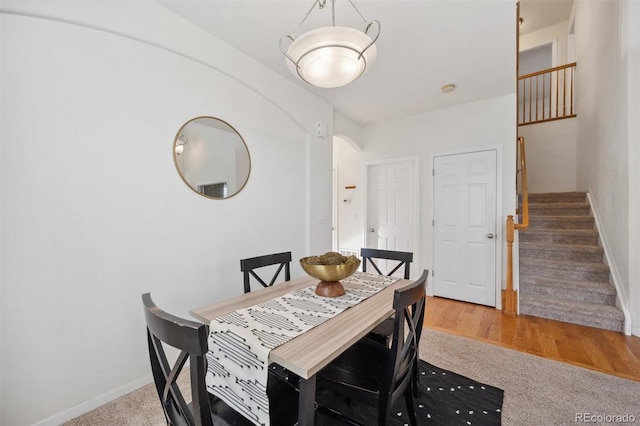 dining area featuring hardwood / wood-style flooring