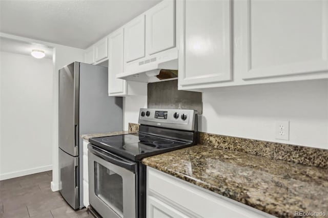 9995 E Harvard Ave Unit 290, Denver, CO 80231 - kitchen with stainless steel appliances, under cabinet range hood, white cabinets, and dark stone counters