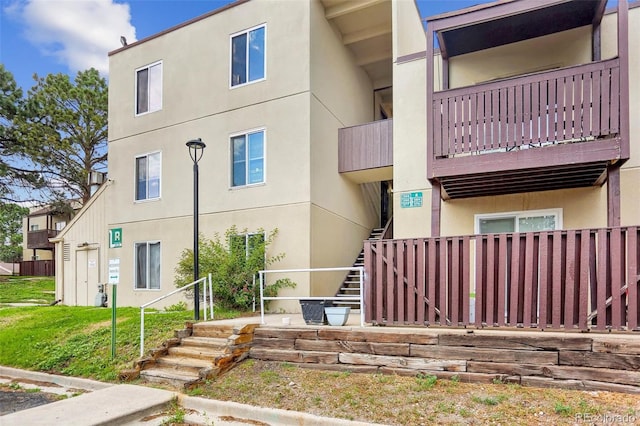9995 E Harvard Ave Unit 290, Denver, CO 80231 - view of building exterior with stairway