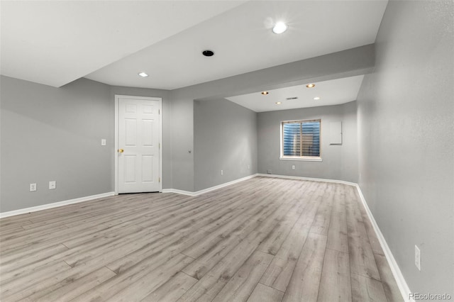 unfurnished room with light hardwood / wood-style floors