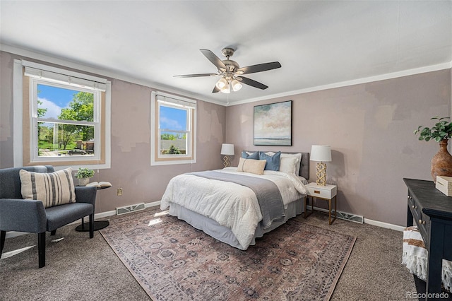 8712 W 64th Way, Arvada, CO 80004 - carpeted bedroom with baseboards and ceiling fan