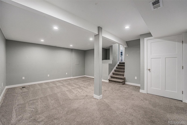 8712 W 64th Way, Arvada, CO 80004 - finished below grade area with carpet flooring, baseboards, recessed lighting, and stairway