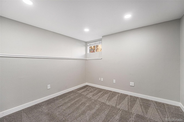 8712 W 64th Way, Arvada, CO 80004 - empty room featuring dark carpet, recessed lighting, and baseboards