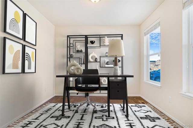 office area with hardwood / wood-style flooring